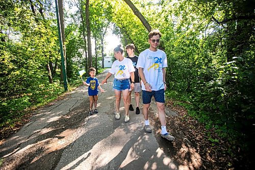 MIKAELA MACKENZIE / WINNIPEG FREE PRESS
	
Danylo (six, left), Olesia, Bohdan (17), and Nazariy Chychkevych on Friday, Aug. 23, 2024. A fundraising run for military supplies in Ukraine is being held on Saturday. Nazariy Chychkevych, a Ukrainian newcomer, is one of the organizers. 

For Matt story.
Winnipeg Free Press 2024