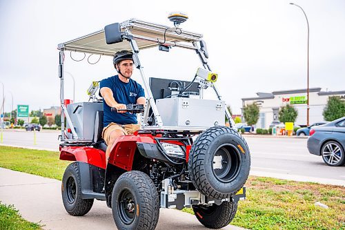 NIC ADAM / FREE PRESS
Field tech Kenneth Morrison shows off the city&#x2019;s new sidewalk surface testing vehicles on the sidewalk in front of 2855 Pembina Hwy. Friday.
240823 - Friday, August 23, 2024.

Reporter: Joyanne