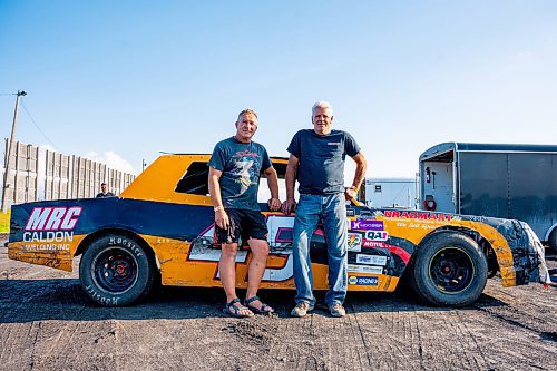 NIC ADAM / FREE PRESS
Dave Rogers (right) and Jeff Copp pictured with their car at Thursday night thunder at Victory Lanes Speedway. 
240822 - Thursday, August 22, 2024.

Reporter: ?