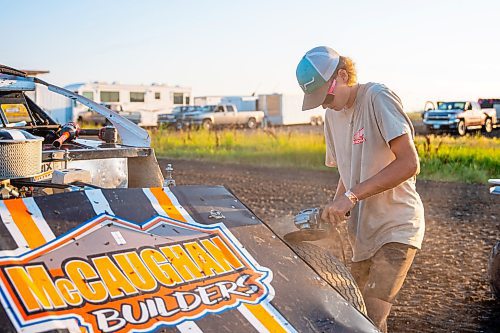 NIC ADAM / FREE PRESS
Ryder Woodward shaves his teams&#x2019; tires at Thursday night thunder at Victory Lanes Speedway. This helps rejuvenate the rubber and gives the driver more grip on the track.
240822 - Thursday, August 22, 2024.

Reporter: ?