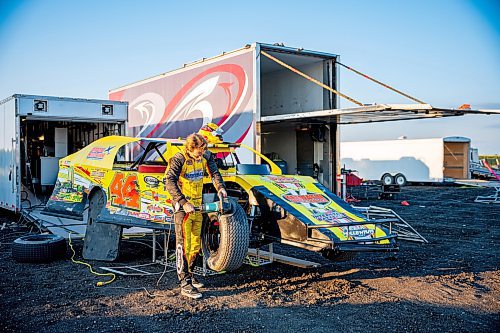 NIC ADAM / FREE PRESS
Austin Hunter shaves his tires at Thursday night thunder at Victory Lanes Speedway. This helps rejuvenate the rubber and gives the driver more grip on the track.
240822 - Thursday, August 22, 2024.

Reporter: ?