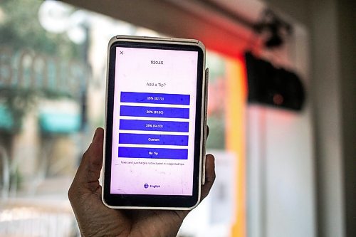 MIKAELA MACKENZIE / WINNIPEG FREE PRESS
	
The tipping prompt screen on the debit machine at Danook Restaurant on Friday, Aug. 23, 2024. The Syrian establishment has a tipping prompt, which helps staff; the restaurant can't afford to pay staff higher wages without raising its menu prices, the owner said. 

For Gabby story.
Winnipeg Free Press 2024