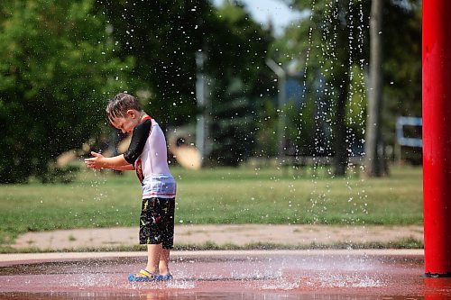 23082024
Three-year-old Bodie Graham plays at the Kin Spray Park on a hot Friday afternoon.  (Tim Smith/The Brandon Sun)