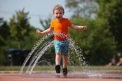 23082024
Three-year-old Cole Chambers cools off at the Kin Spray Park on a hot Friday afternoon.  (Tim Smith/The Brandon Sun)