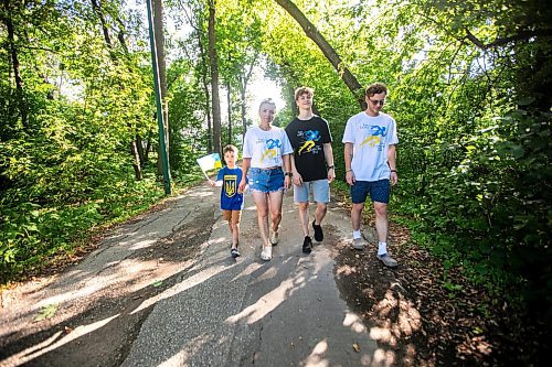 MIKAELA MACKENZIE / WINNIPEG FREE PRESS
	
Danylo (six, left), Olesia, Bohdan (17), and Nazariy Chychkevych on Friday, Aug. 23, 2024. A fundraising run for military supplies in Ukraine is being held on Saturday. Nazariy Chychkevych, a Ukrainian newcomer, is one of the organizers. 

For Matt story.
Winnipeg Free Press 2024