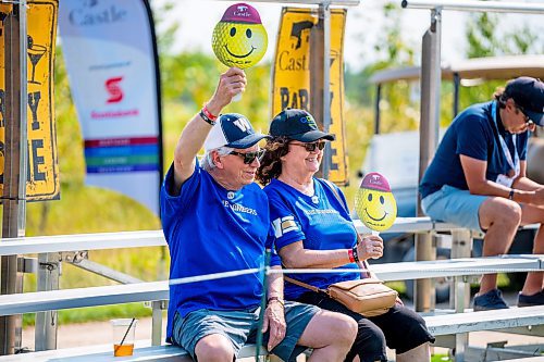 NIC ADAM / FREE PRESS
Ron and Diane Hucal cheer players on at hole 17, the party hole, at the PGA Centreport Canada Rail Park Manitoba Open at Southwood Golf &amp; Country Club Friday.
240823 - Friday, August 23, 2024.

Reporter: Mike McIntyre