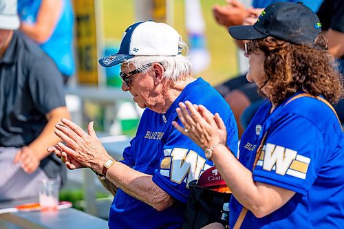 NIC ADAM / FREE PRESS
Ron and Diane Hucal cheer players on at hole 17, the party hole, at the PGA Centreport Canada Rail Park Manitoba Open at Southwood Golf &amp; Country Club Friday.
240823 - Friday, August 23, 2024.

Reporter: Mike McIntyre