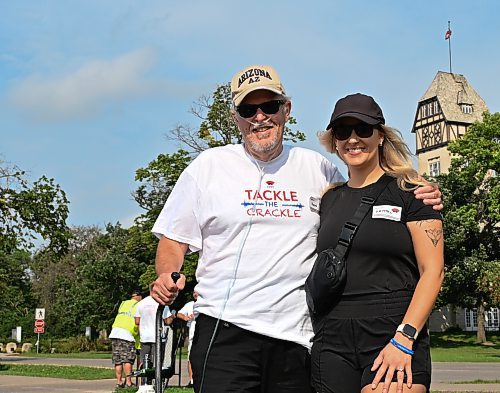 MATTHEW FRANK / FREE PRESS
Ken Friess (left) and his daughter, Kristin, walked together during Winnipeg's first Walk for Pulmonary Fibrosis event at Assiniboine Park on Saturday. 