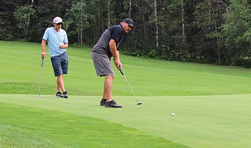 Chad Daciuk watches his partner Lyle Meek putt during the final of the men's scramble at the Tamarack on Saturday at the Clear Lake Golf Course. (Perry Bergson/The Brandon Sun)
Aug. 24, 2024