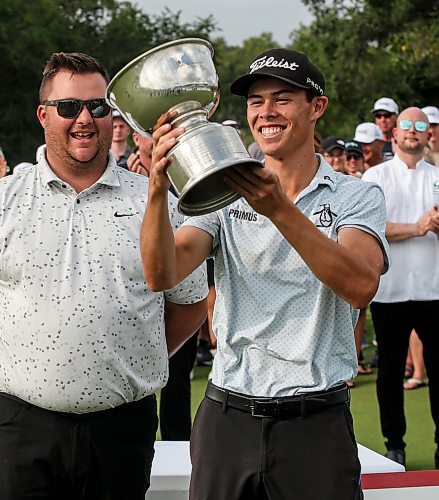 JOHN WOODS / FREE PRESS
John Keefer winner of the Manitoba Open receives the trophy from tournament director Brendan Baldwin at Southwood Golf Club Sunday, August 25, 2024. 

Reporter: mike