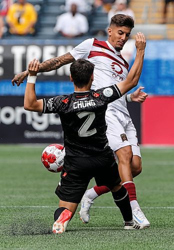 JOHN WOODS / WINNIPEG FREE PRESS
Valour FC&#x2019;s Diogo Dias da Ressurei&#xe7;&#xe3;o (20) defends against Vancouver FC&#x2019;s Kadin Chung (2) during first half Canadian Premier League action in Winnipeg Sunday, August 25, 2024. 
Reporter: ?