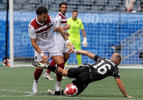 JOHN WOODS / WINNIPEG FREE PRESS
Valour FC&#x2019;s Jordan Swibel (9) defends against Vancouver FC&#x2019;s Olivier Rommens (16) during first half Canadian Premier League action in Winnipeg Sunday, August 25, 2024. 
Reporter: ?