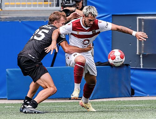 JOHN WOODS / WINNIPEG FREE PRESS
Vancouver FC&#x2019;s James Cameron (25) defends and fouls Valour FC&#x2019;s Jordan Faria (17) during first half Canadian Premier League action in Winnipeg Sunday, August 25, 2024. 
Reporter: ?