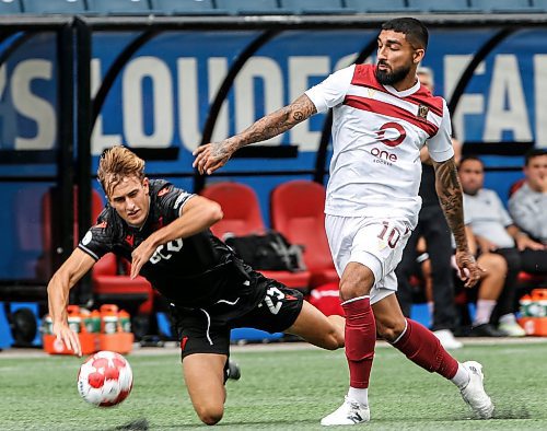 JOHN WOODS / WINNIPEG FREE PRESS
Vancouver FC&#x2019;s James Cameron (25) defends against Valour FC&#x2019;s Shaan Hundal (10) during first half Canadian Premier League action in Winnipeg Sunday, August 25, 2024. 
Reporter: ?