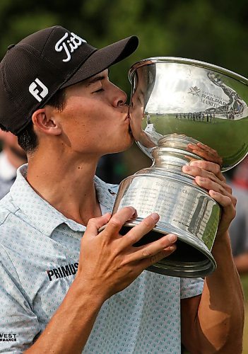 JOHN WOODS / FREE PRESS
John Keefer winner of the Manitoba Open kisses the trophy at Southwood Golf Club Sunday, August 25, 2024. 

Reporter: mike