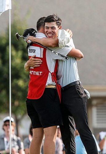 JOHN WOODS / FREE PRESS
John Keefer hugs his caddie after defeating Neil Shipley and winning the Manitoba Open at Southwood Golf Club Sunday, August 25, 2024. 

Reporter: mike