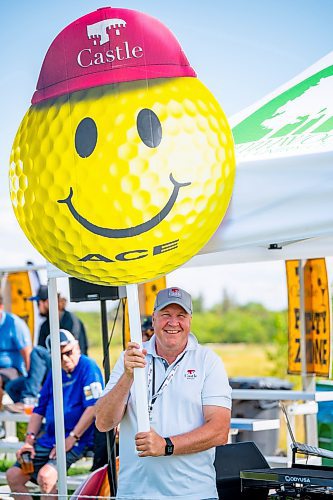 NIC ADAM / FREE PRESS
Eden Elliott, with Castle Mortgage, cheers players on at hole 17, the party hole, at the PGA Centreport Canada Rail Park Manitoba Open at Southwood Golf &amp; Country Club Friday.
240823 - Friday, August 23, 2024.

Reporter: Mike McIntyre