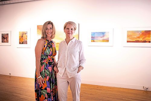 MIKAELA MACKENZIE / WINNIPEG FREE PRESS
	
Gallery owner Julie Walsh (left) and artist Bette Woodland at the &#x48c;OOK CLOSER&#x4e0;exhibit at Soul Gallery Inc. on Friday, Aug. 23, 2024. 

For arts story.
Winnipeg Free Press 2024