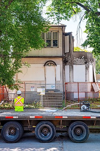 NIC ADAM / FREE PRESS
A crew demolishes the vacant house along Manitoba Ave. that burned down due to multiple fires in a few short months. According to the land-owner, the city approved his months-old demolition permit after the release of our last article on the subject.
240826 - Monday, August 26, 2024.

Reporter: Malak