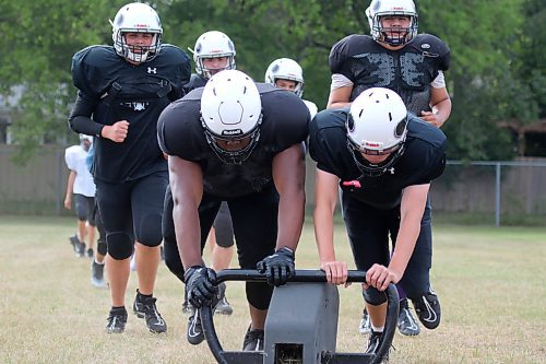 The Vincent Massey Vikings are into training camp for the fast-approaching Winnipeg High School Football League season, pushing sleds in the summer heat to prepare for a season opener less than two weeks away. (Thomas Friesen/The Brandon Sun)