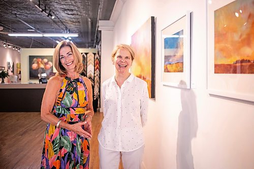 MIKAELA MACKENZIE / WINNIPEG FREE PRESS
	
Gallery owner Julie Walsh (left) and artist Bette Woodland at the &#x48c;OOK CLOSER&#x4e0;exhibit at Soul Gallery Inc. on Friday, Aug. 23, 2024. 

For arts story.
Winnipeg Free Press 2024