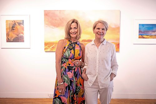 MIKAELA MACKENZIE / WINNIPEG FREE PRESS
	
Gallery owner Julie Walsh (left) and artist Bette Woodland at the &#x48c;OOK CLOSER&#x4e0;exhibit at Soul Gallery Inc. on Friday, Aug. 23, 2024. 

For arts story.
Winnipeg Free Press 2024