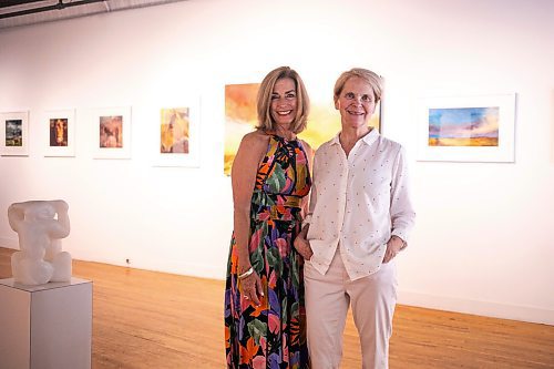 MIKAELA MACKENZIE / WINNIPEG FREE PRESS
	
Gallery owner Julie Walsh (left) and artist Bette Woodland at the &#x48c;OOK CLOSER&#x4e0;exhibit at Soul Gallery Inc. on Friday, Aug. 23, 2024. 

For arts story.
Winnipeg Free Press 2024