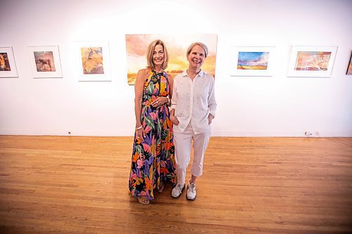 MIKAELA MACKENZIE / WINNIPEG FREE PRESS
	
Gallery owner Julie Walsh (left) and artist Bette Woodland at the &#x48c;OOK CLOSER&#x4e0;exhibit at Soul Gallery Inc. on Friday, Aug. 23, 2024. 

For arts story.
Winnipeg Free Press 2024