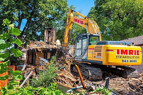 NIC ADAM / FREE PRESS
A crew demolishes the vacant house along Manitoba Ave. that burned down due to multiple fires in a few short months. According to the land-owner, the city approved his months-old demolition permit after the release of our last article on the subject.
240826 - Monday, August 26, 2024.

Reporter: Malak