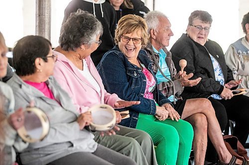 MIKAELA MACKENZIE / WINNIPEG FREE PRESS
	
Judy Lafreniere (centre, green pants) and Agnes Bonnefoy (cenre left, pink hoodie) laugh during the musical spoons workshop at the 6th annual Manitoba Mtis Federation elders and youth gathering at Selkirk Park on Tuesday, Aug. 27, 2024. The gathering brings together elders and youth from across the regions so that the youth can learn traditional skills, hear oral teachings and learn the principles of culturally-focused interactions with knowledge keepers.

Standup.
Winnipeg Free Press 2024