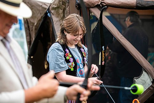 MIKAELA MACKENZIE / WINNIPEG FREE PRESS
	
Kurt Gougeon (18) tries out archery at the 6th annual Manitoba Mtis Federation elders and youth gathering at Selkirk Park on Tuesday, Aug. 27, 2024. The gathering brings together elders and youth from across the regions so that the youth can learn traditional skills, hear oral teachings and learn the principles of culturally-focused interactions with knowledge keepers.

Standup.
Winnipeg Free Press 2024