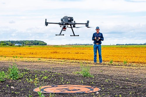 NIC ADAM / FREE PRESS
Agriculture student Tanner West gives a demonstration on how to use drones for various farming implements at Innovation Farms Tuesday.
240826 - Monday, August 26, 2024.

Reporter: Gabby