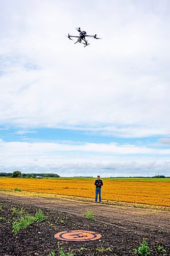 NIC ADAM / FREE PRESS
Agriculture student Tanner West gives a demonstration on how to use drones for various farming implements at Innovation Farms Tuesday.
240826 - Monday, August 26, 2024.

Reporter: Gabby