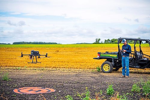 NIC ADAM / FREE PRESS
Agriculture student Tanner West gives a demonstration on how to use drones for various farming implements at Innovation Farms Tuesday.
240826 - Monday, August 26, 2024.

Reporter: Gabby