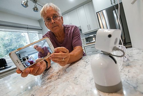 JOHN WOODS / FREE PRESS
Terry Lutomsky, who recently purchased portable security cameras and was planning to take advantage of the government&#x2019;s security rebate, is photographed with a camera in his home Tuesday, August 27, 2024. Lutomsky went to the government website to apply for the rebate and discovered the program had run out of money and closed down.

Reporter: chris