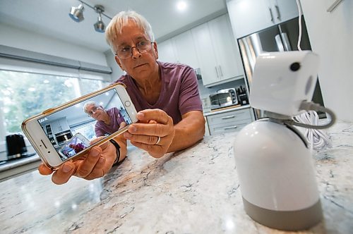 JOHN WOODS / FREE PRESS
Terry Lutomsky, who recently purchased portable security cameras and was planning to take advantage of the government&#x2019;s security rebate, is photographed with a camera in his home Tuesday, August 27, 2024. Lutomsky went to the government website to apply for the rebate and discovered the program had run out of money and closed down.

Reporter: chris