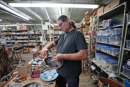 Ruth Bonneville /Free Press

49.8 - INTERSECTION - Ideal Electric

Photo of Michael as he rewires a light back to incandescent lighting to be used in the film industry.  

Photos of Michael Gruber, owner of  Ideal Electric, along with various shots inside his long-standing business on Selkirk Ave.. 

What: This is for an Intersection piece on Ideal Electric, a lighting biz started by Michael's grandfather 100 years ago, out of a Main Street garage. Michael's father took over from his own dad, and Michael is presently the third-generation owner. Place is the land time forgot - there are new, in-box parts and pieces for lamps from before the Second World War. Big-box stores send customers there all the time for replacement parts, etc. saying if Ideal Electric doesn't have it, nobody will. They also specialize in custom-made lampshades to match lamps that have been in a family forever. 

Shots of Michael touring the building - it's a 7,000 square-foot-site encompassing two buildings on Selkirk, rather non-descript from the outside, but sprawling within. 

This is for the Sat Aug 31 Intersection - 

Dave Sanderson's story 

Aug 27th, 2024