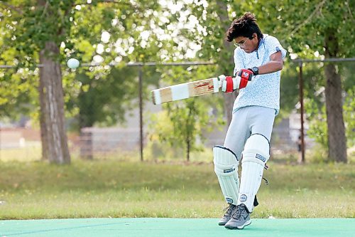 27082024
Dax Patel connects with the ball while playing cricket with friends at Crocus Plains Regional Secondary School on Tuesday.
(Tim Smith/The Brandon Sun)