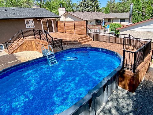 Photos by Marc LaBossiere / Free Press
This two-tiered, multi-angled deck was built using treated lumber and complements the pool perfectly. 