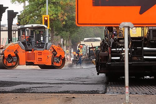 Road repaving work continues on Princess Avenue between Ninth Street and 10th Street on Wednesday. (Tim Smith/The Brandon Sun)