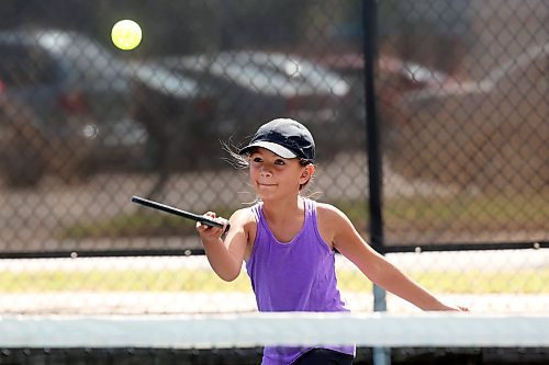 Nine-year-old Paisley Henry plays pickleball with her grandparents at the Stanley Park pickleball courts in Brandon on Wednesday. (Tim Smith/The Brandon Sun)