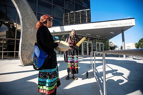 MIKAELA MACKENZIE / WINNIPEG FREE PRESS
Amber Flett (right) and Mandy Fenner sing a healing song in front of the law courts on Wednesday, Aug. 28, 2024. The Skibiki sentencing is taking place today.


Winnipeg Free Press 2024