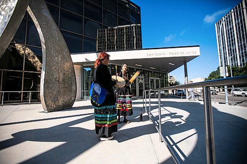 MIKAELA MACKENZIE / WINNIPEG FREE PRESS
Amber Flett (right) and Mandy Fenner sing a healing song in front of the law courts on Wednesday, Aug. 28, 2024. The Skibiki sentencing is taking place today.


Winnipeg Free Press 2024