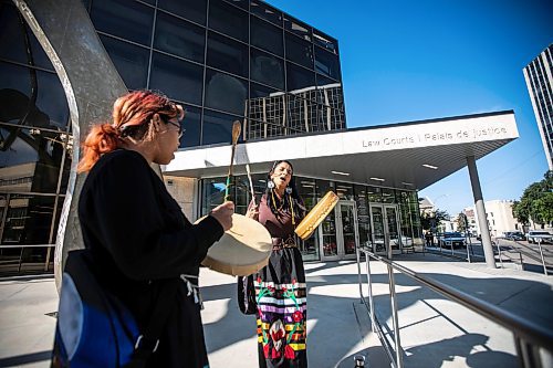 MIKAELA MACKENZIE / WINNIPEG FREE PRESS
Amber Flett (right) and Mandy Fenner sing a healing song in front of the law courts on Wednesday, Aug. 28, 2024. The Skibiki sentencing is taking place today.


Winnipeg Free Press 2024