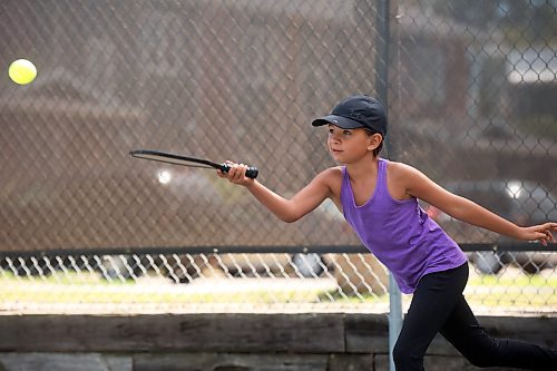 28082024
Nine-year-old Paisley Henry plays pickleball with her grandparents at the Stanley Park pickleball courts in Brandon on Wednesday. (Tim Smith/The Brandon Sun)