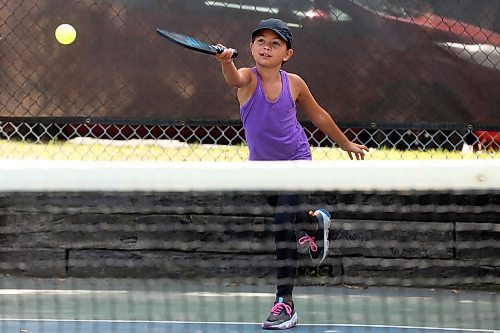 28082024
Nine-year-old Paisley Henry plays pickleball with her grandparents at the Stanley Park pickleball courts in Brandon on Wednesday. (Tim Smith/The Brandon Sun)