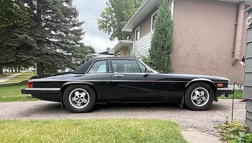 The side shot of Steve Van Vlaenderen's 1988 Jaguar XJS convertible, V-12. (Michele McDougall/The Brandon Sun)