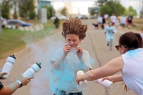 Runner Emerson Telfer is blasted with coloured powder Thursday during the CFB Shilo Fun Run 2024 hosted by CFB Shilo Community Recreation and the Shilo Military Family Resource Centre. See more photos on Page A2. (Tim Smith/The Brandon Sun)