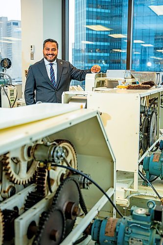 NIC ADAM / FREE PRESS
Cereals Canada CEO Dean Dias pictured next to some ramen noodle machines on the 12th floor of their building Thursday.
240829 - Thursday, August 29, 2024.

Reporter: Martin Cash