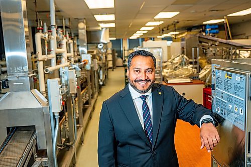 NIC ADAM / FREE PRESS
Cereals Canada CEO Dean Dias pictured next to some ramen noodle machines on the 12th floor of their building Thursday.
240829 - Thursday, August 29, 2024.

Reporter: Martin Cash